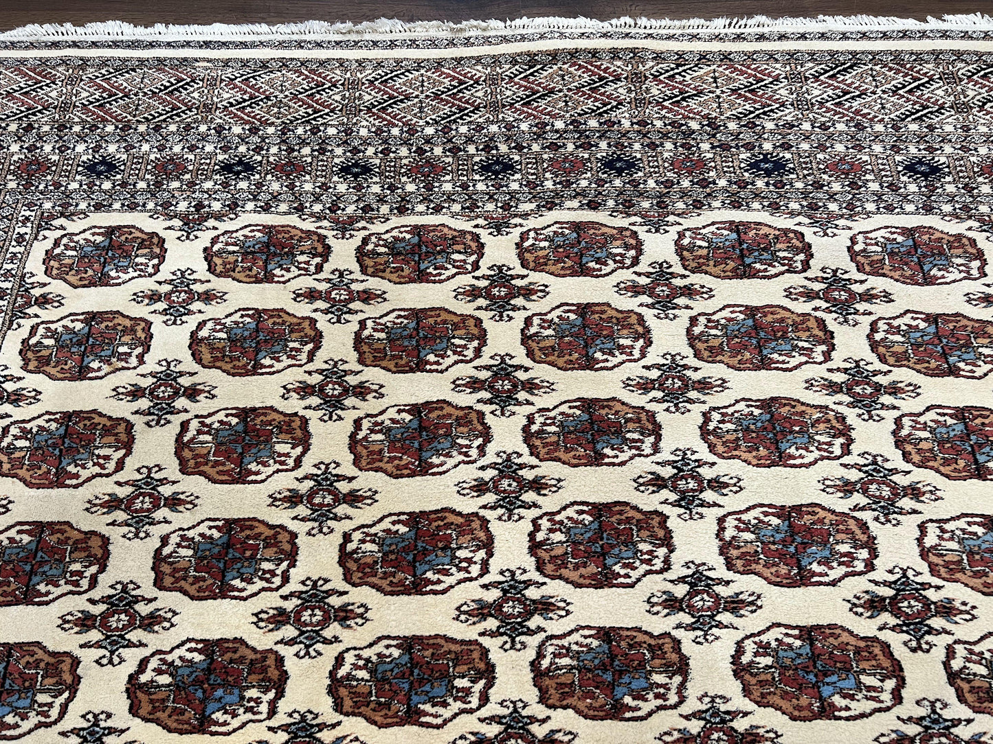 Pakistani Bokhara Rug 8x10 Vintage Handmade Turkoman Carpet With Elephant Foot Motif Ivory Cream Black Red