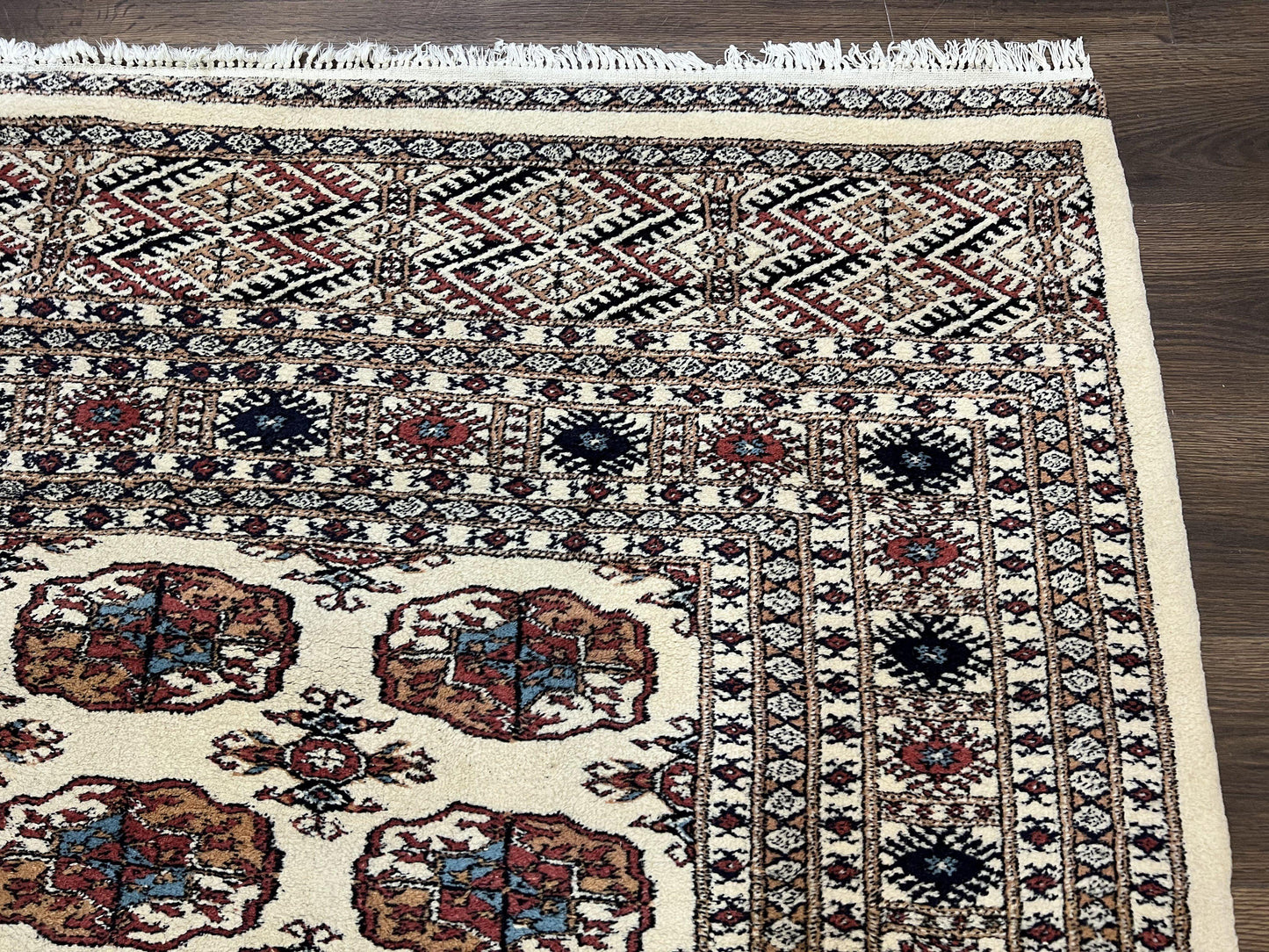 Pakistani Bokhara Rug 8x10 Vintage Handmade Turkoman Carpet With Elephant Foot Motif Ivory Cream Black Red