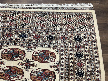 Pakistani Bokhara Rug 8x10 Vintage Handmade Turkoman Carpet With Elephant Foot Motif Ivory Cream Black Red
