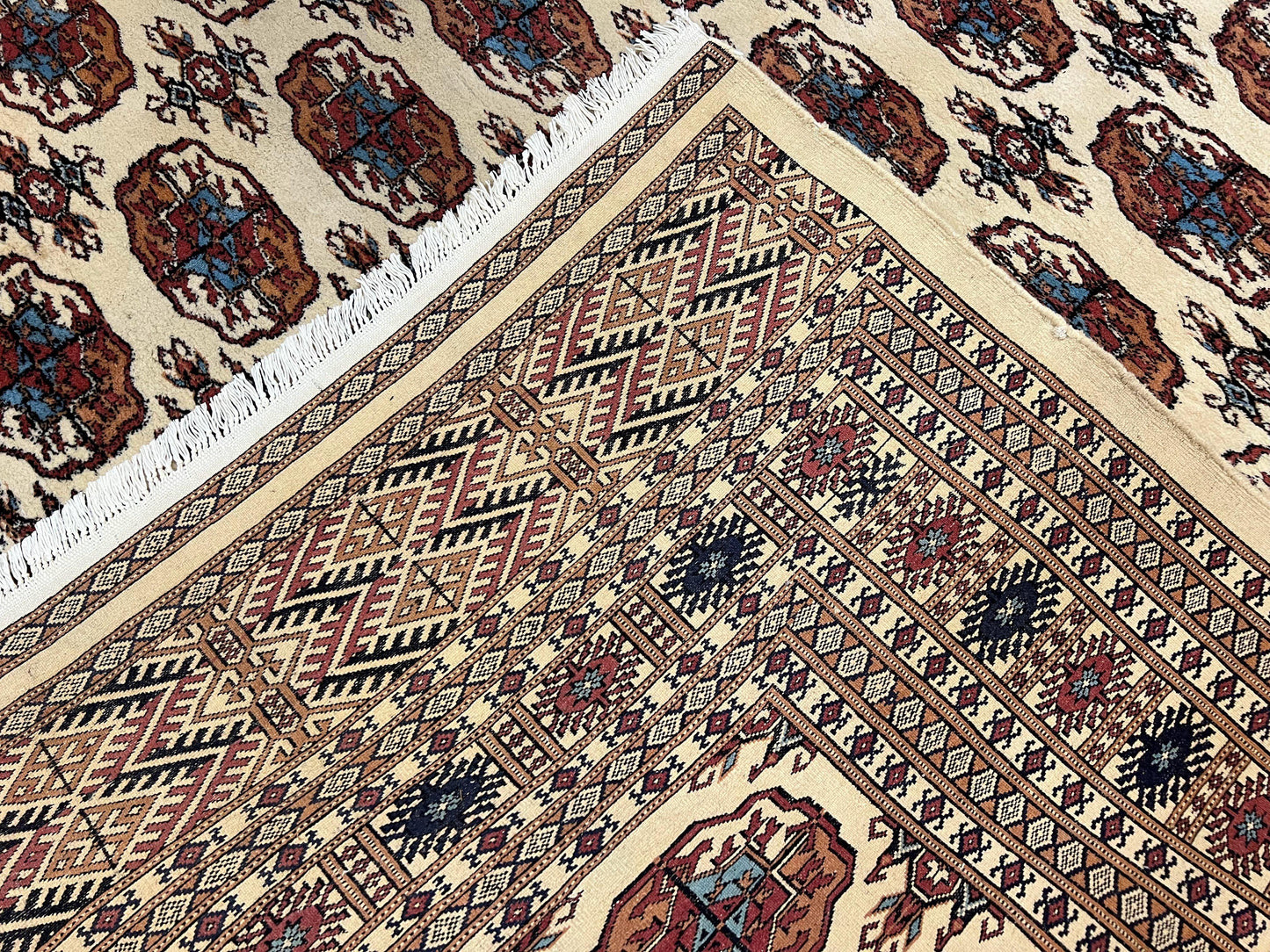 Pakistani Bokhara Rug 8x10 Vintage Handmade Turkoman Carpet With Elephant Foot Motif Ivory Cream Black Red