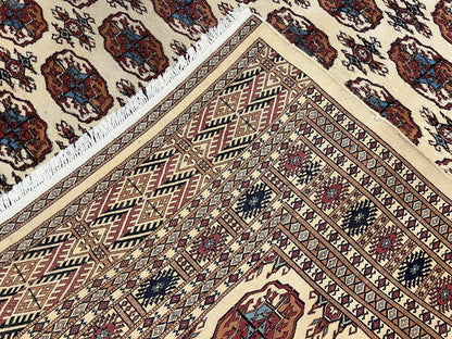 Pakistani Bokhara Rug 8x10 Vintage Handmade Turkoman Carpet With Elephant Foot Motif Ivory Cream Black Red