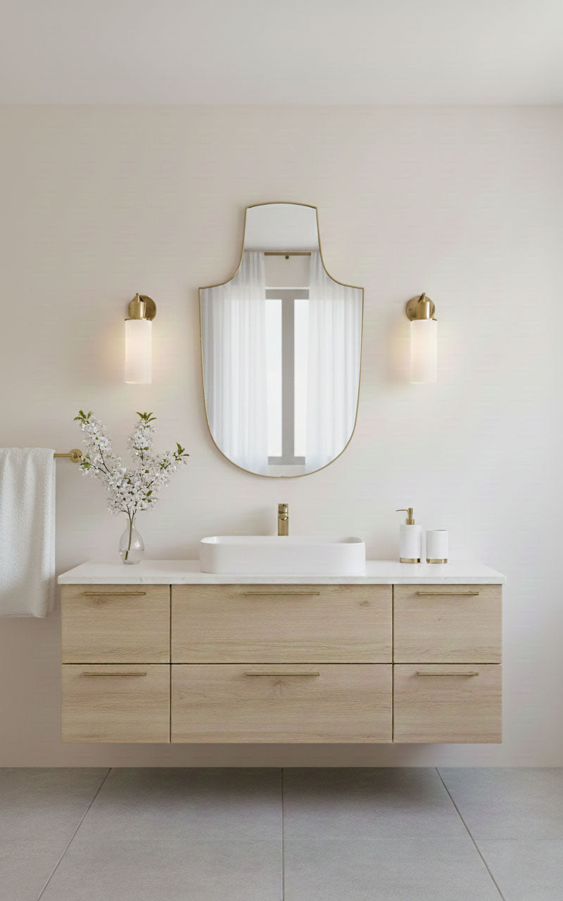Handmade arch-top shield mirror in minimalist bathroom