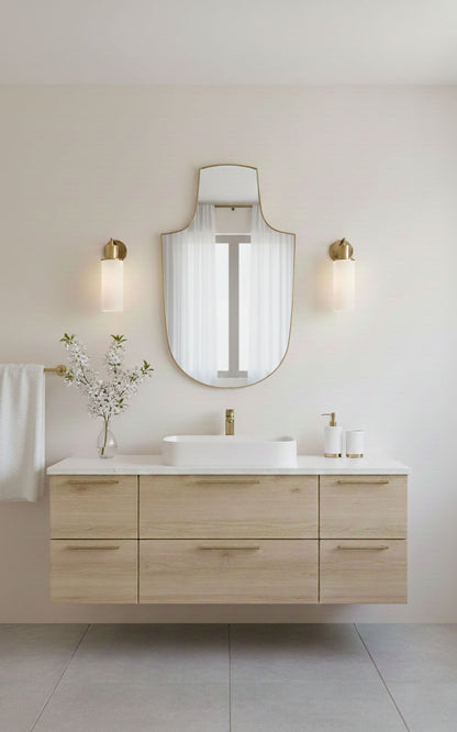 Handmade arch-top shield mirror in minimalist bathroom