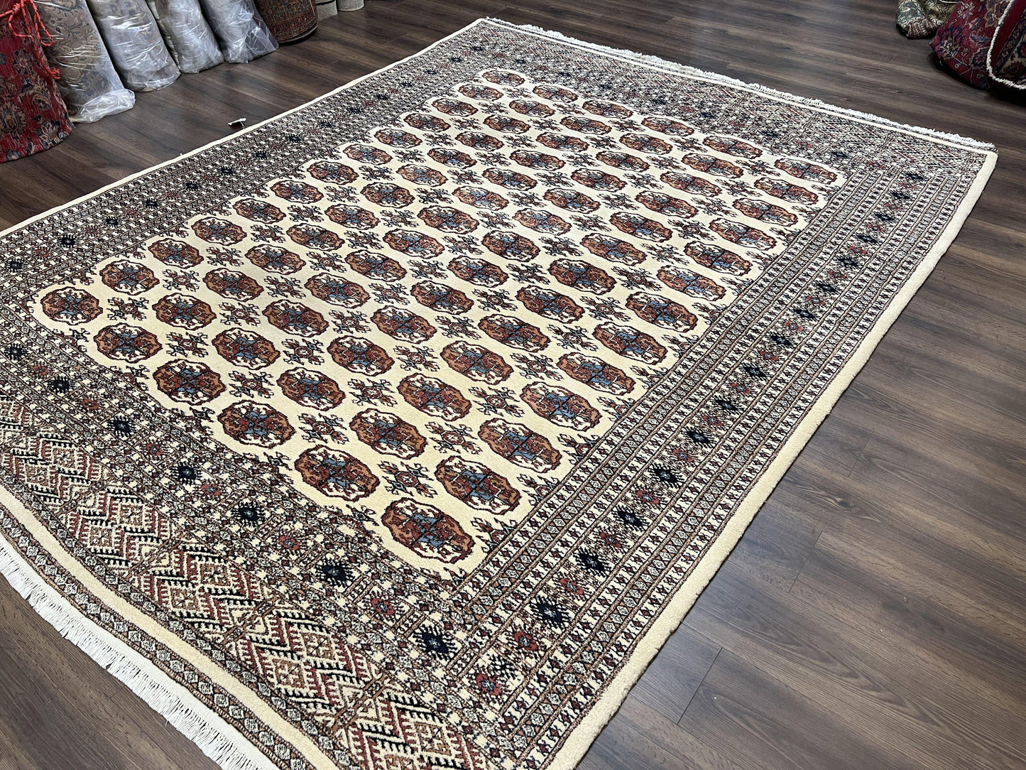 Pakistani Bokhara Rug 8x10 Vintage Handmade Turkoman Carpet With Elephant Foot Motif Ivory Cream Black Red