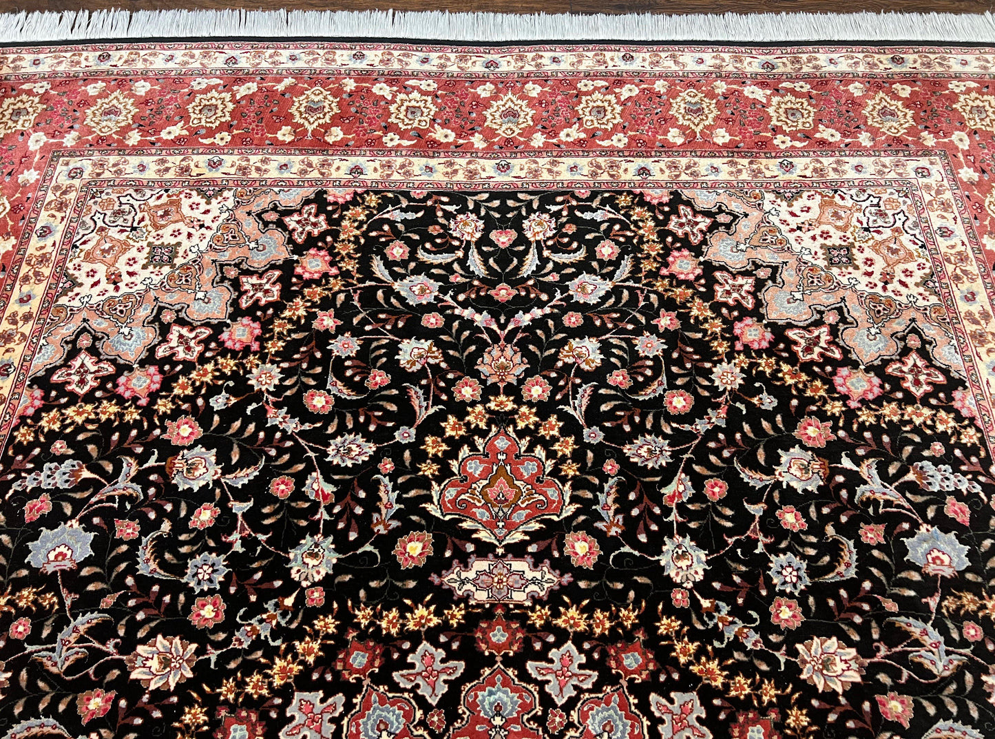 Black Tabriz rug
