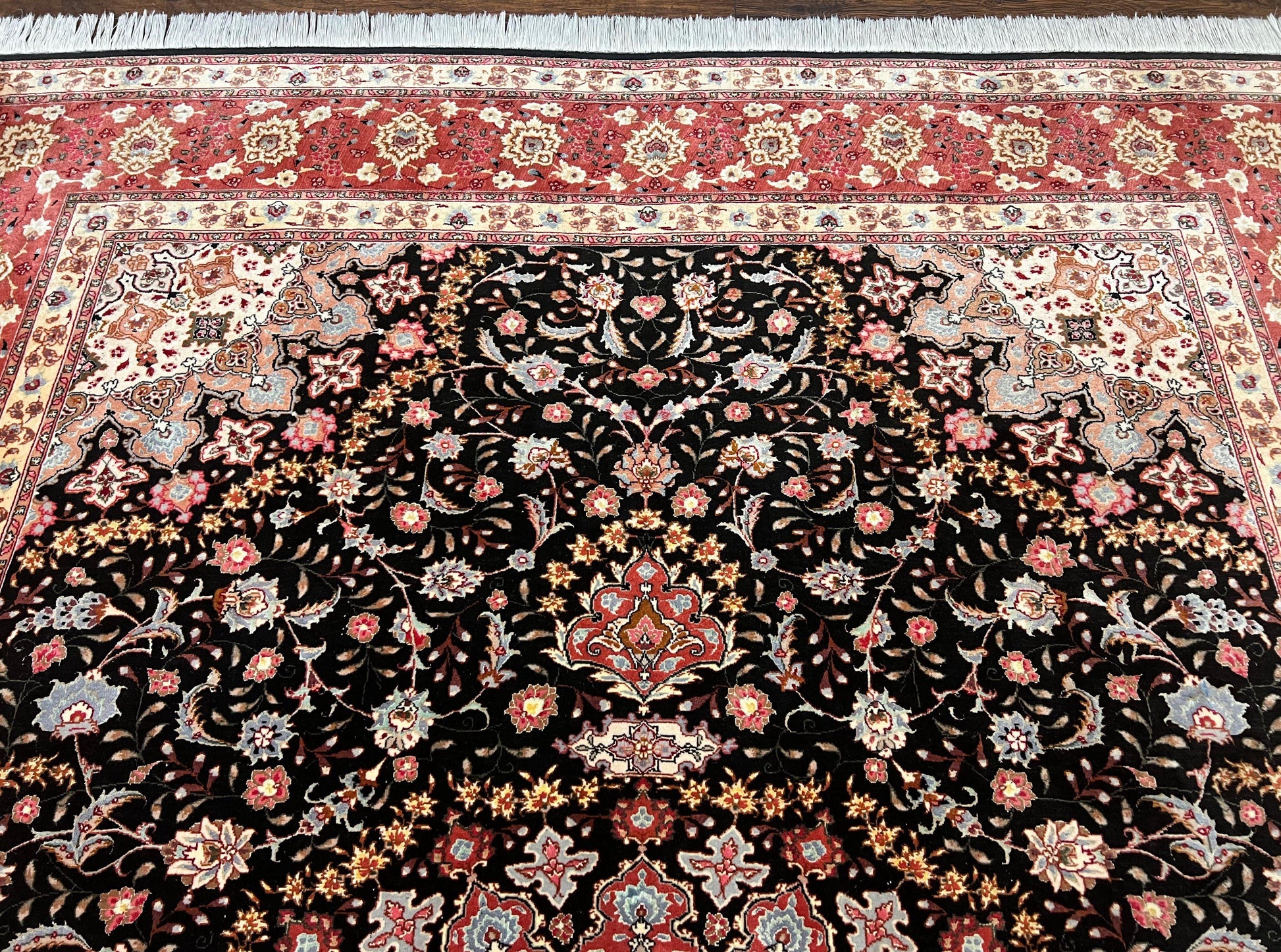 Black Tabriz rug