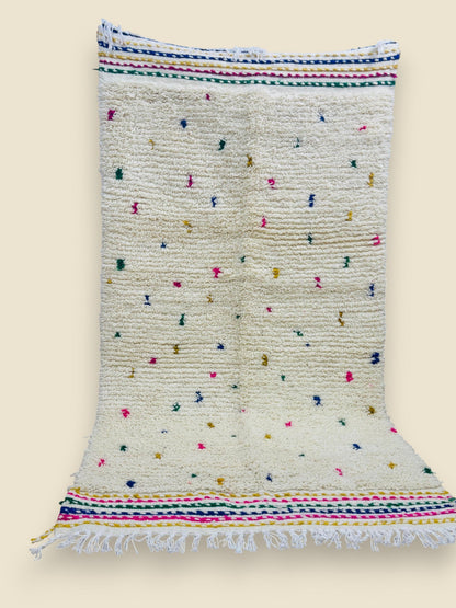 Fringed Berber area rug