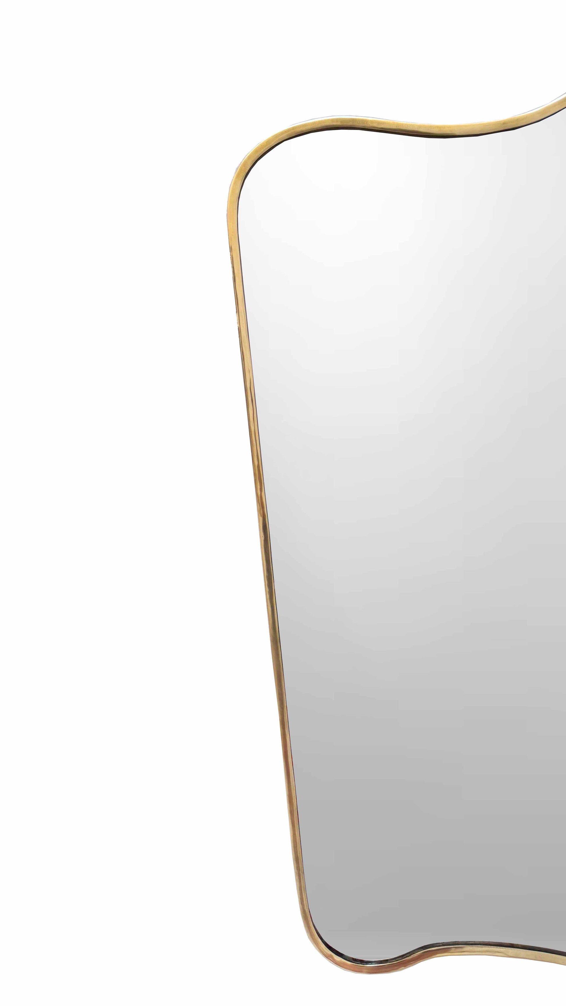 Curved brass mirror with an organic, irregular shape and a slim, unlacquered brass frame on a white background.