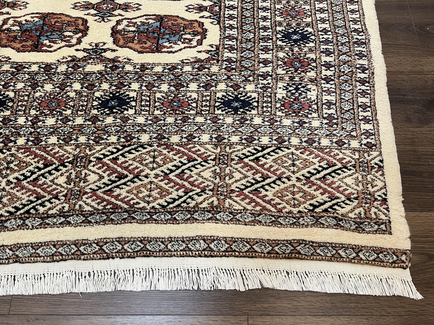 Pakistani Bokhara Rug 8x10 Vintage Handmade Turkoman Carpet With Elephant Foot Motif Ivory Cream Black Red