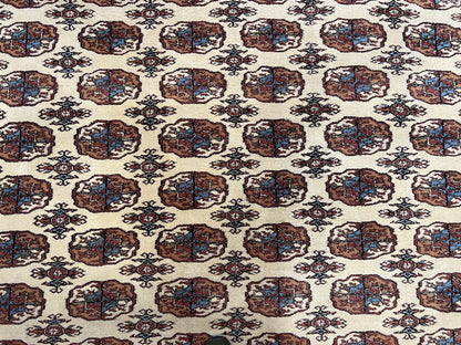 Pakistani Bokhara Rug 8x10 Vintage Handmade Turkoman Carpet With Elephant Foot Motif Ivory Cream Black Red