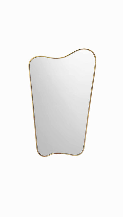 Curved brass mirror with an organic, irregular shape and a slim, unlacquered brass frame on a white background.