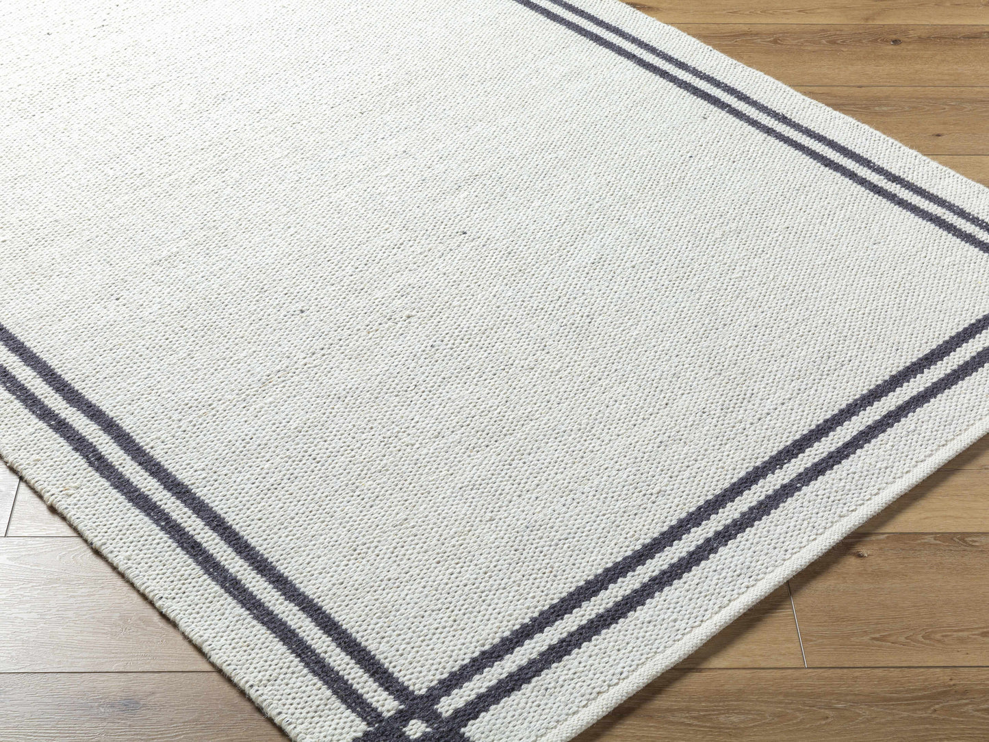 Nimue Wool Area Rug - Elegant Border Design for Cozy Interiors