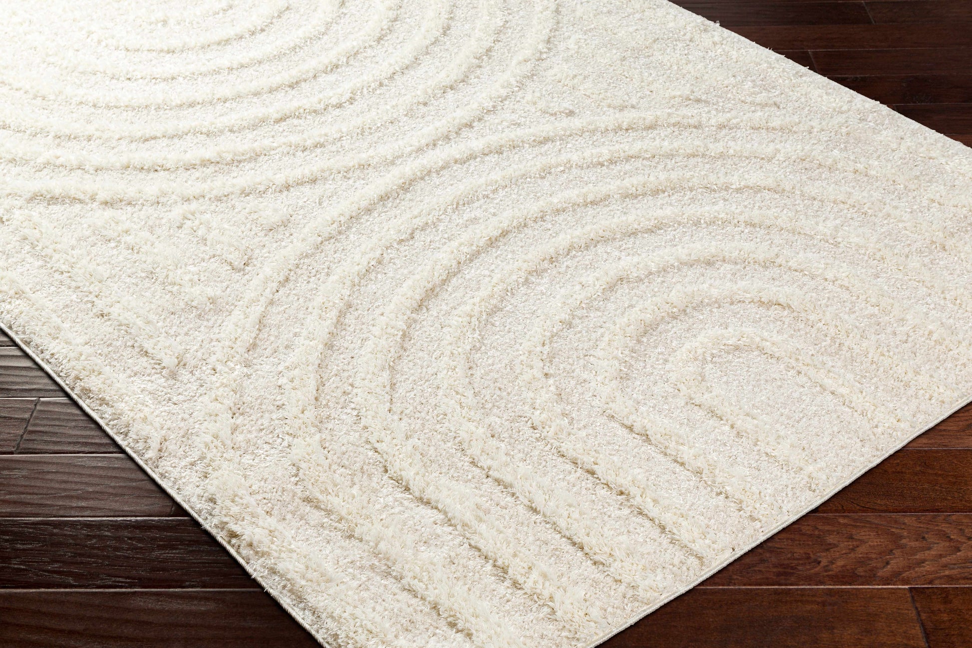 Arnel machine-woven cream rug