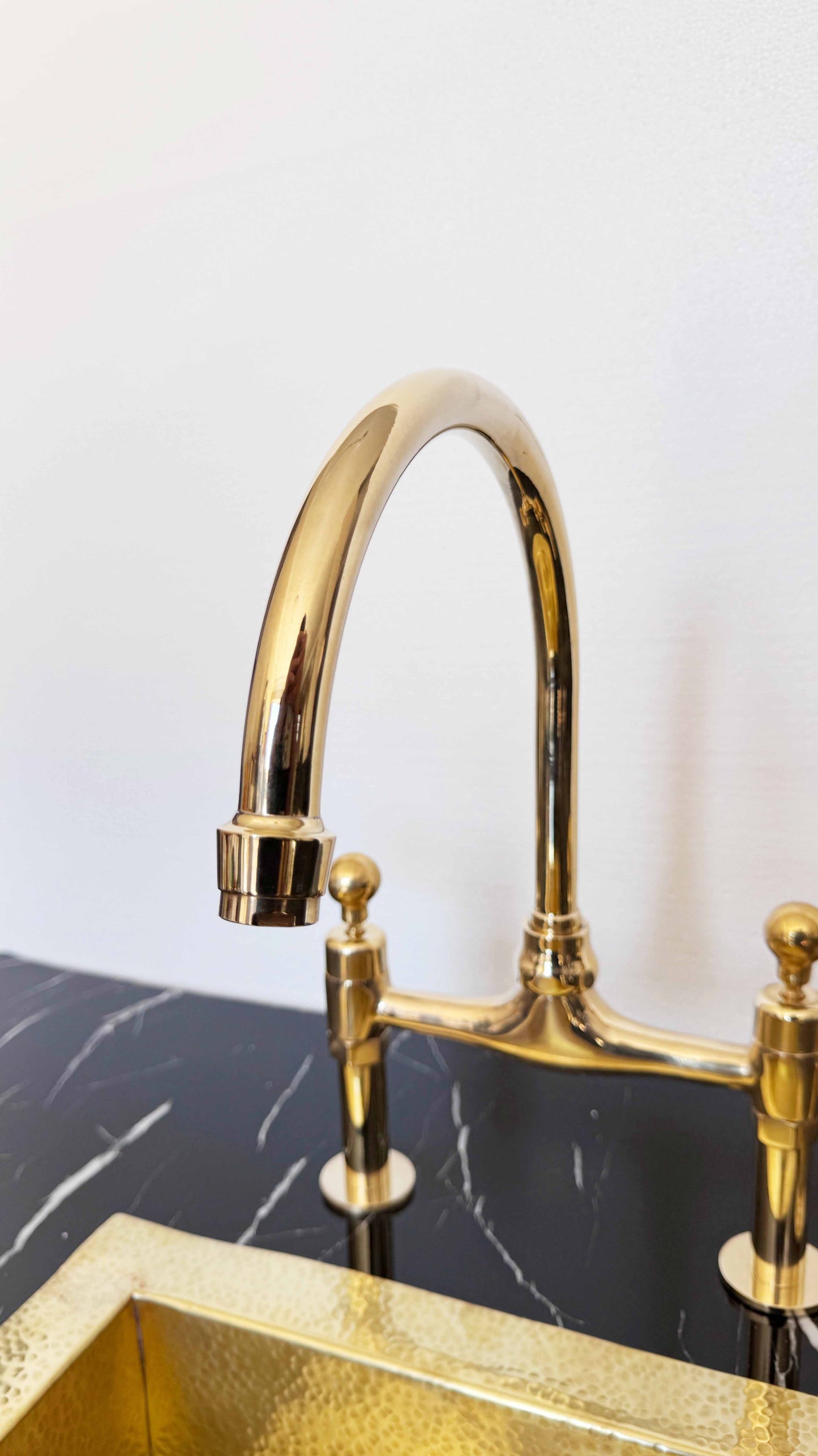 unlacquered brass faucet