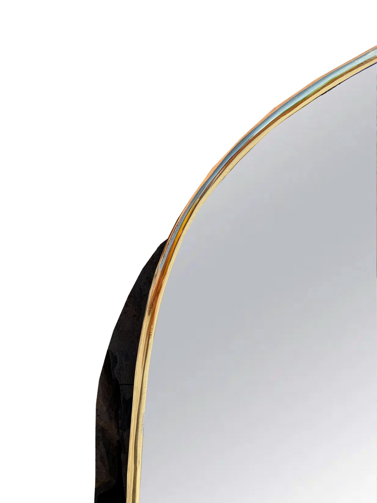 a mirror with a curved edge is shown