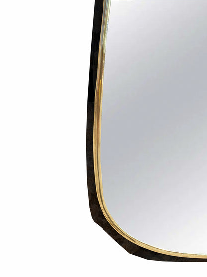 a mirror with a curved edge is shown