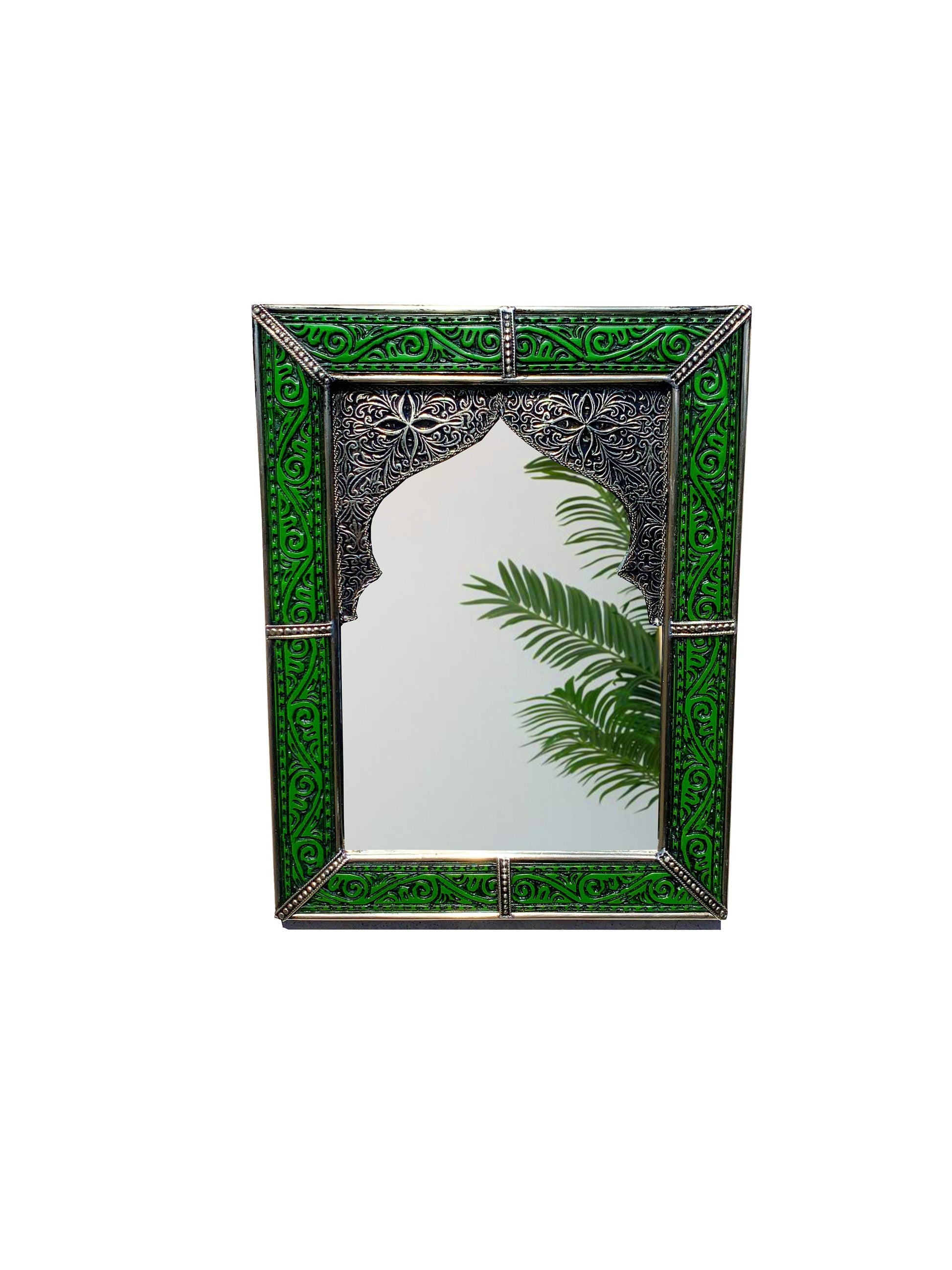 a mirror with a palm leaf on it