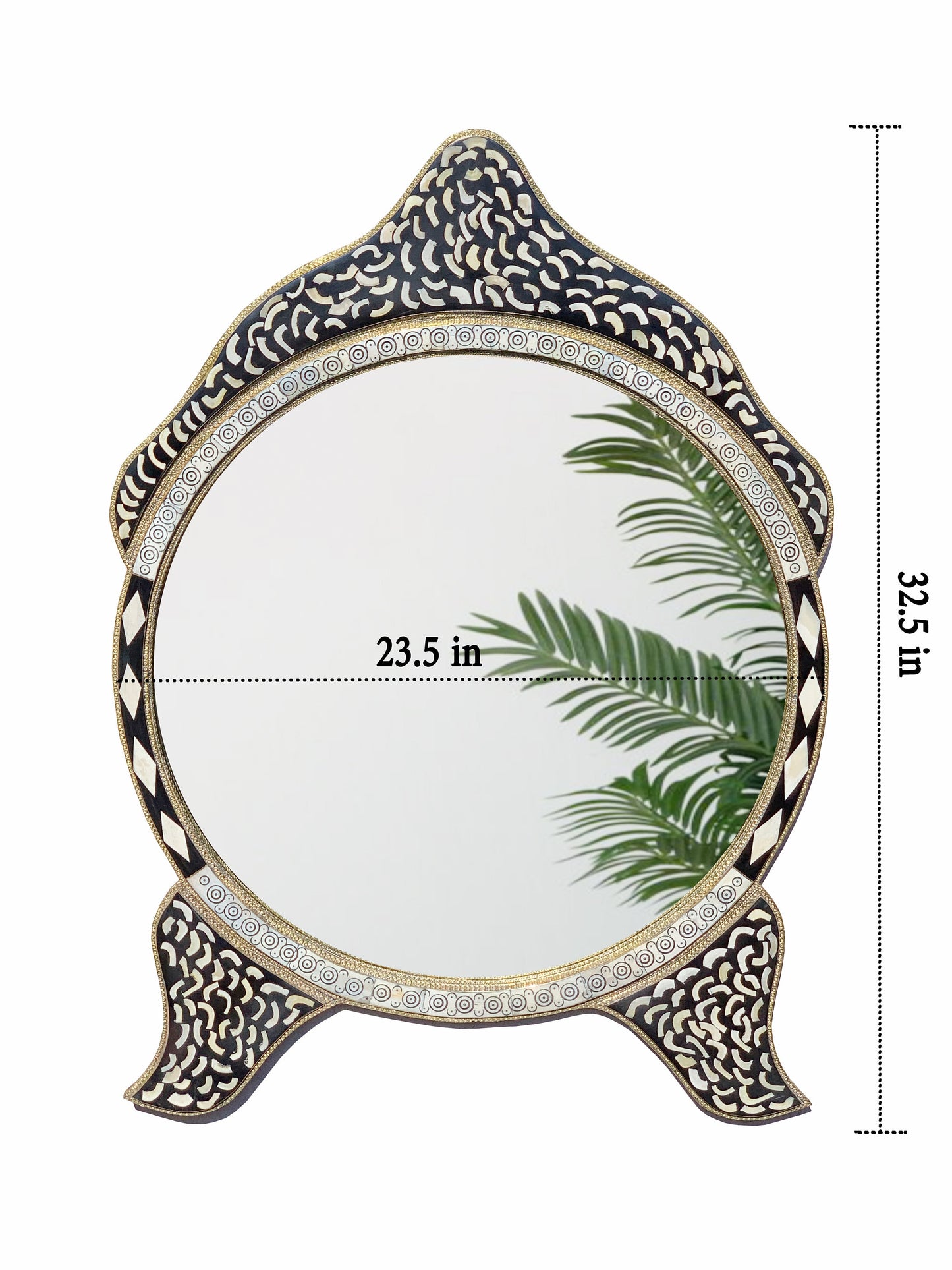 a mirror with a palm tree on it