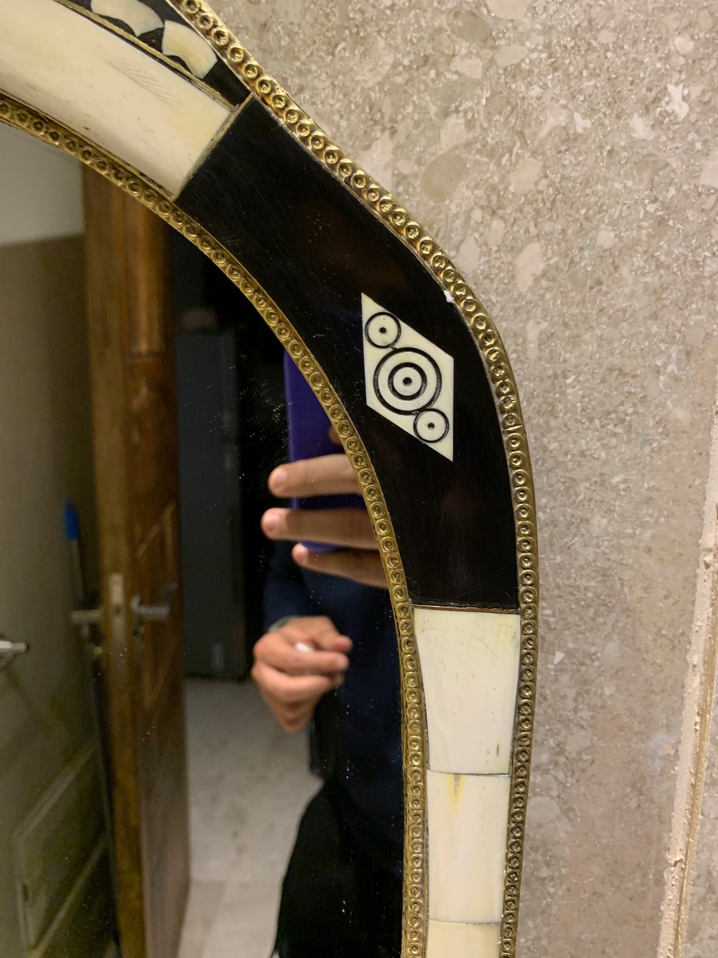 a person taking a picture of themselves in a mirror