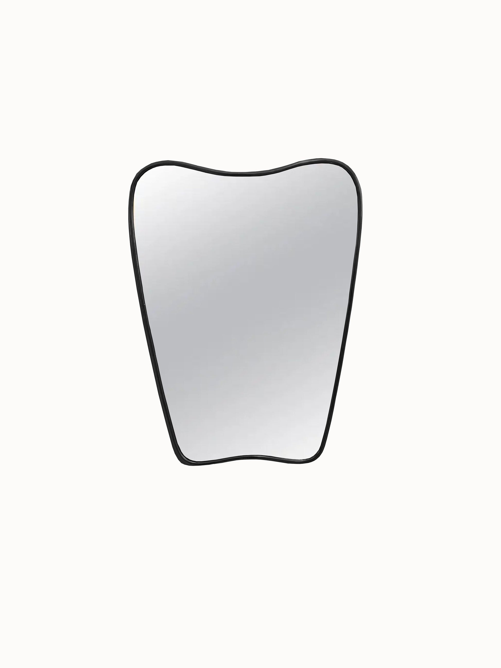 an apple shaped mirror on a white wall