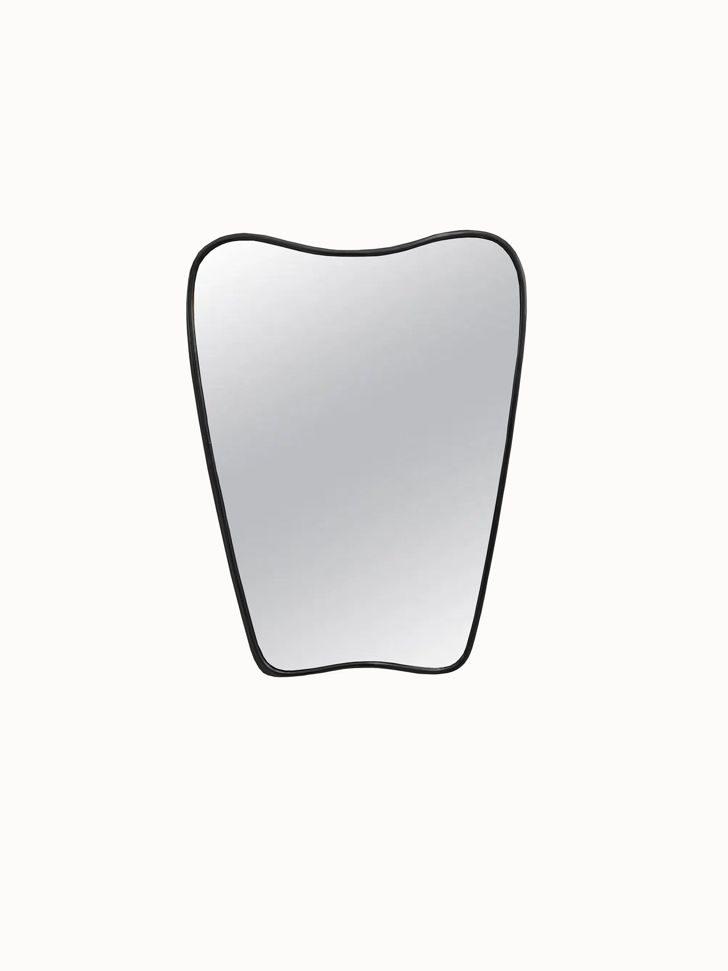 an apple shaped mirror on a white wall