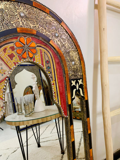 a table with a mirror on top of it